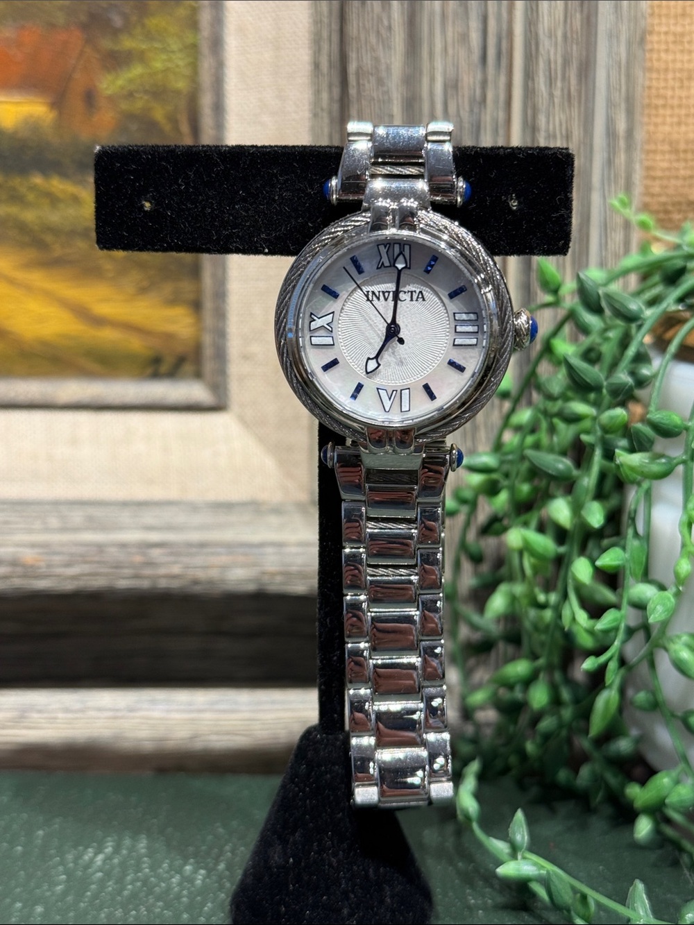 Invicta Silver Watch with White Dial and Blue Accents